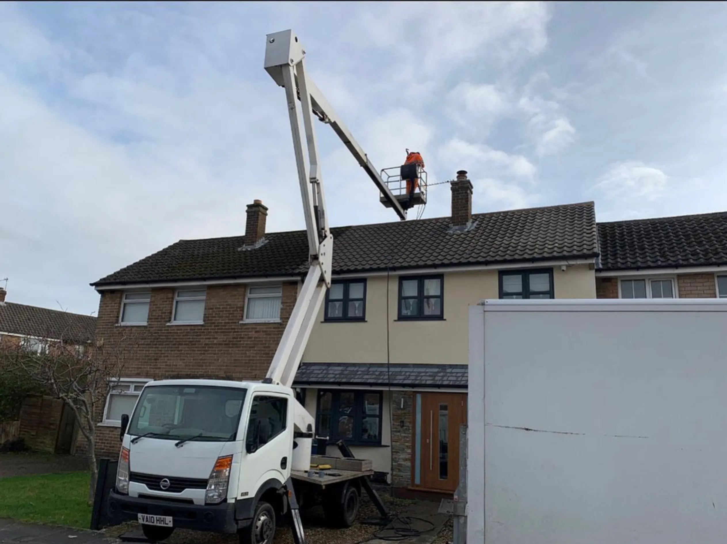 Soft washing roof cleaning