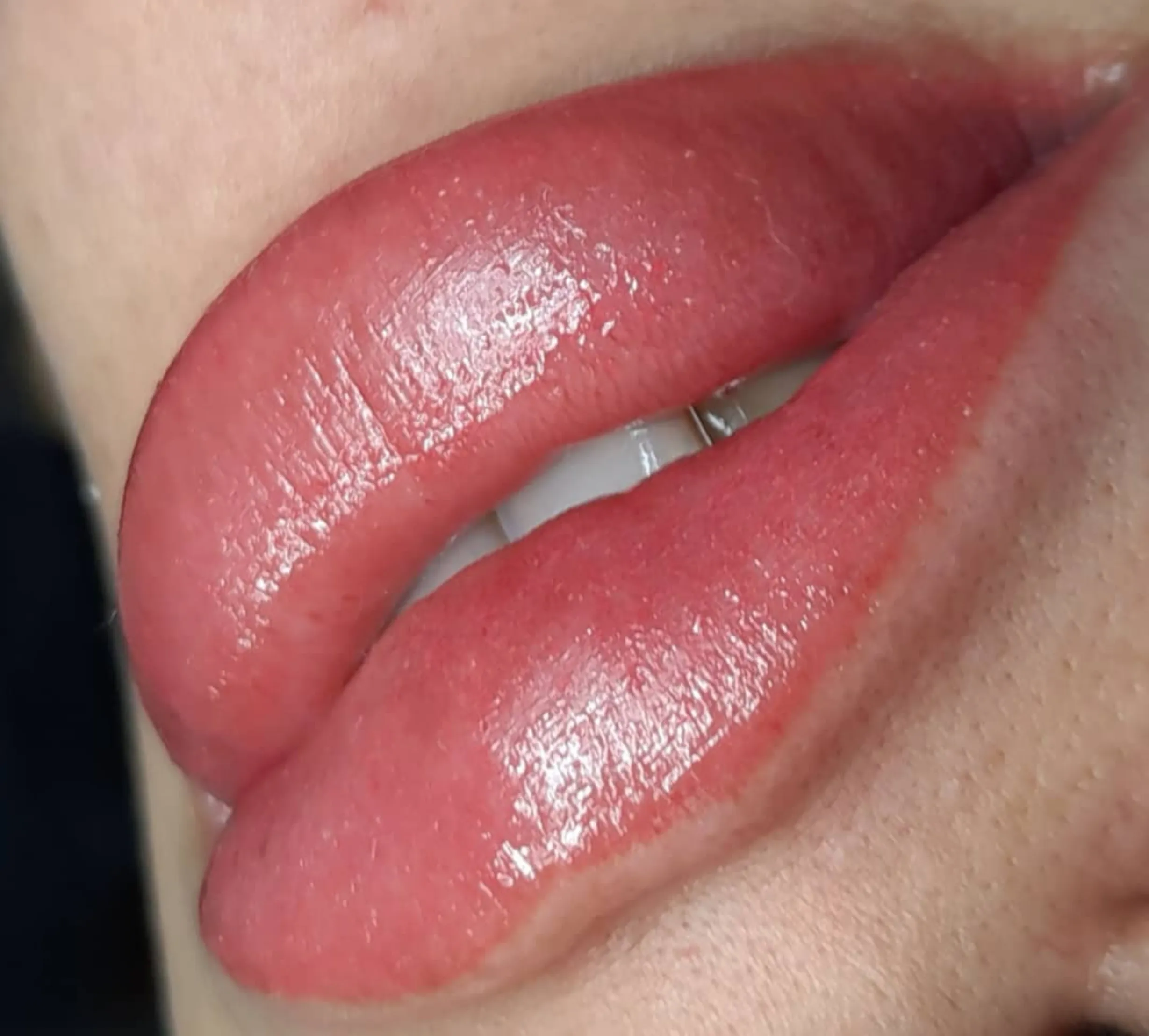 mature skin lip tattoo